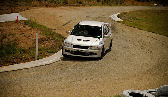 A picture of me driving the Evo 7 on the hillclimb track in Queanbeyan