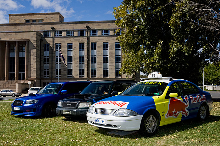 RBTaxi next to some Foresters