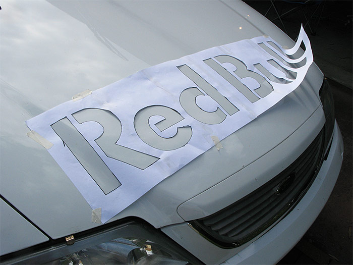 A Red Bull stencil applied to the bonnet